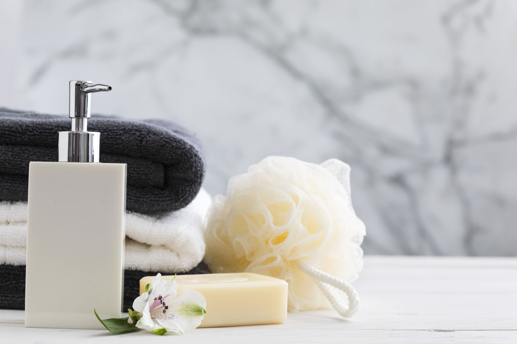 Soap and sponges by shower